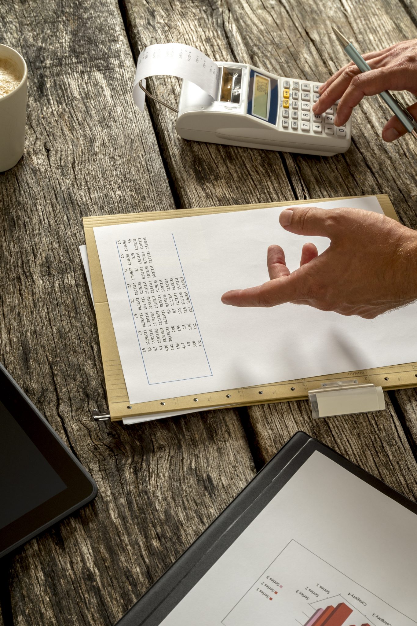 Financial adviser or accountant checking statistical data and nu Financial advisor and Accountant | Brock CPA Firm Jacksonville FL